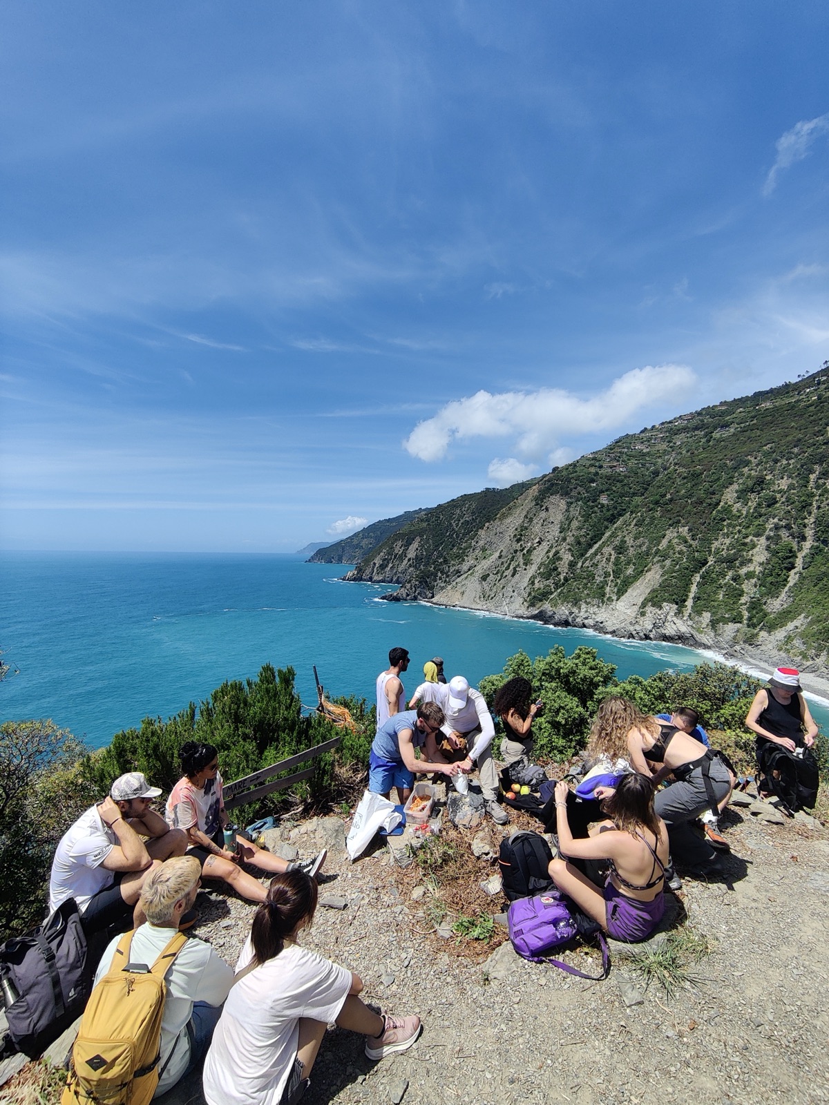 People stopping for a picnic on the hillside above the Ligurian sea during the Slowlit pilot